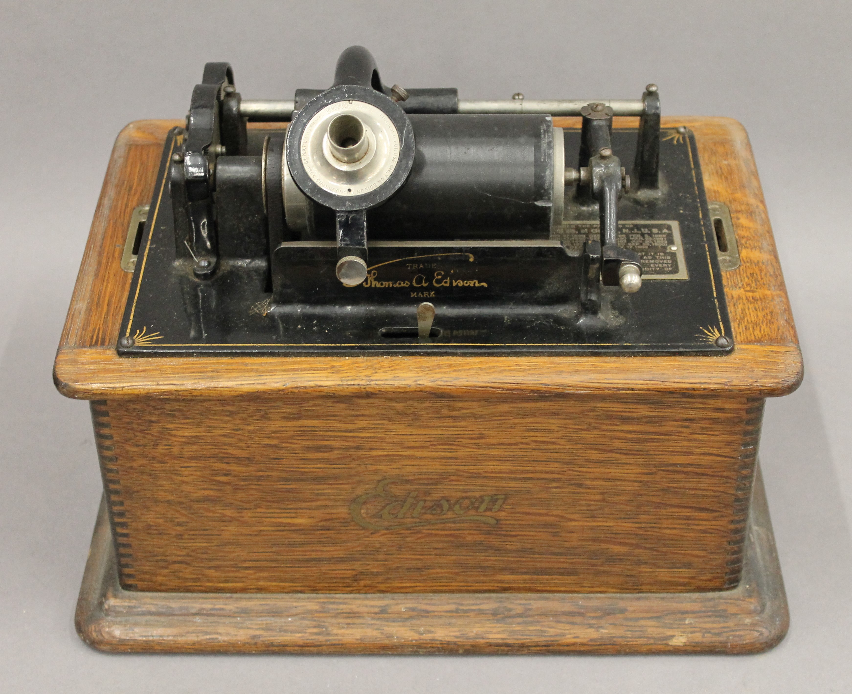 A Thomas A Edison oak cased phonograph with horn; together with a selection of phonograph rolls. 32. - Image 3 of 6