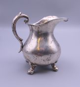 A Continental silver cream jug. 8 cm high. 2.1 troy ounces.