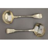 A pair of silver ladles. Each 17.5 cm long. 3.7 troy ounces.