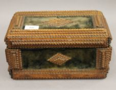 A Tramp Art casket. 28.5 cm wide.