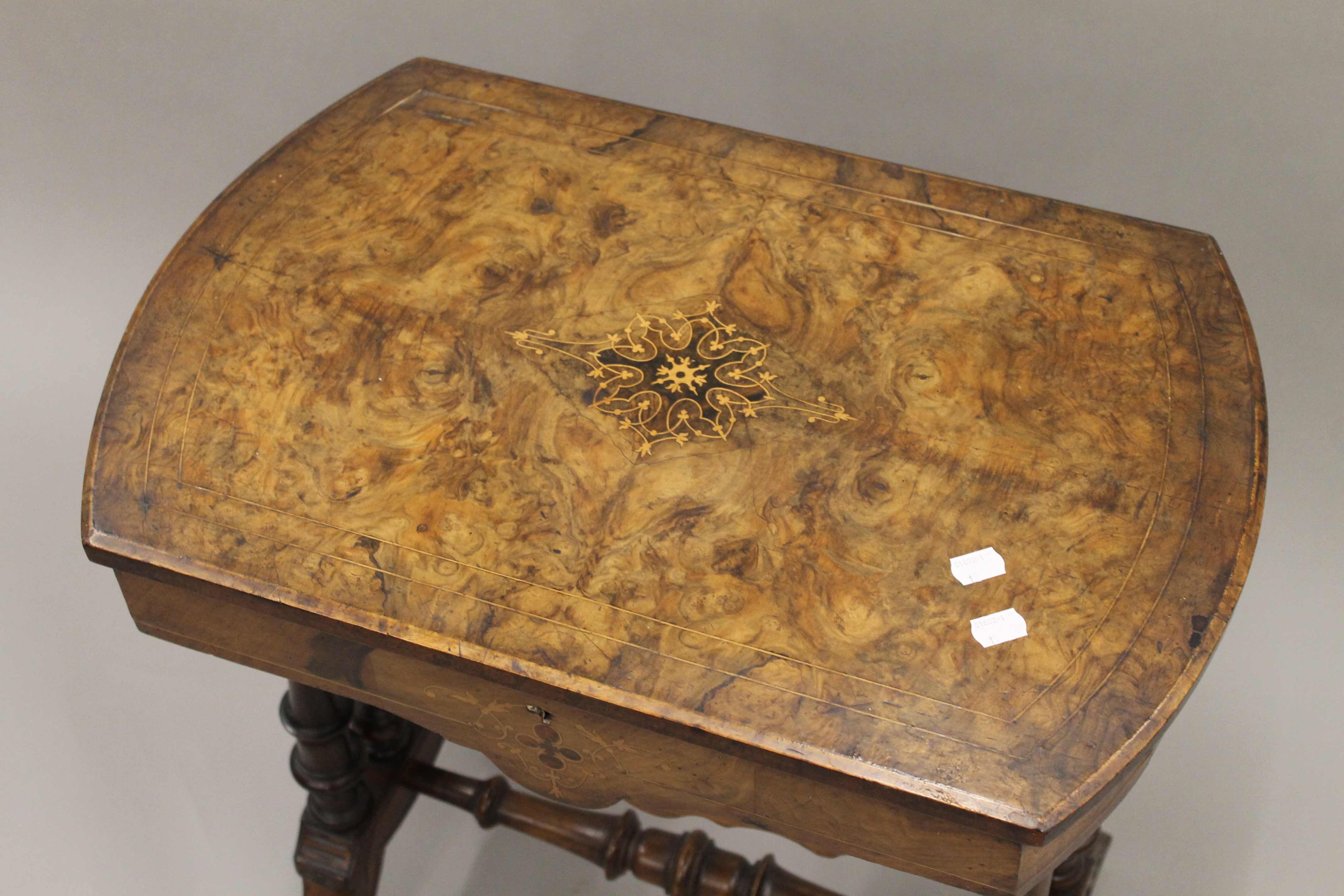 A Victorian inlaid burr walnut work table. - Image 3 of 6