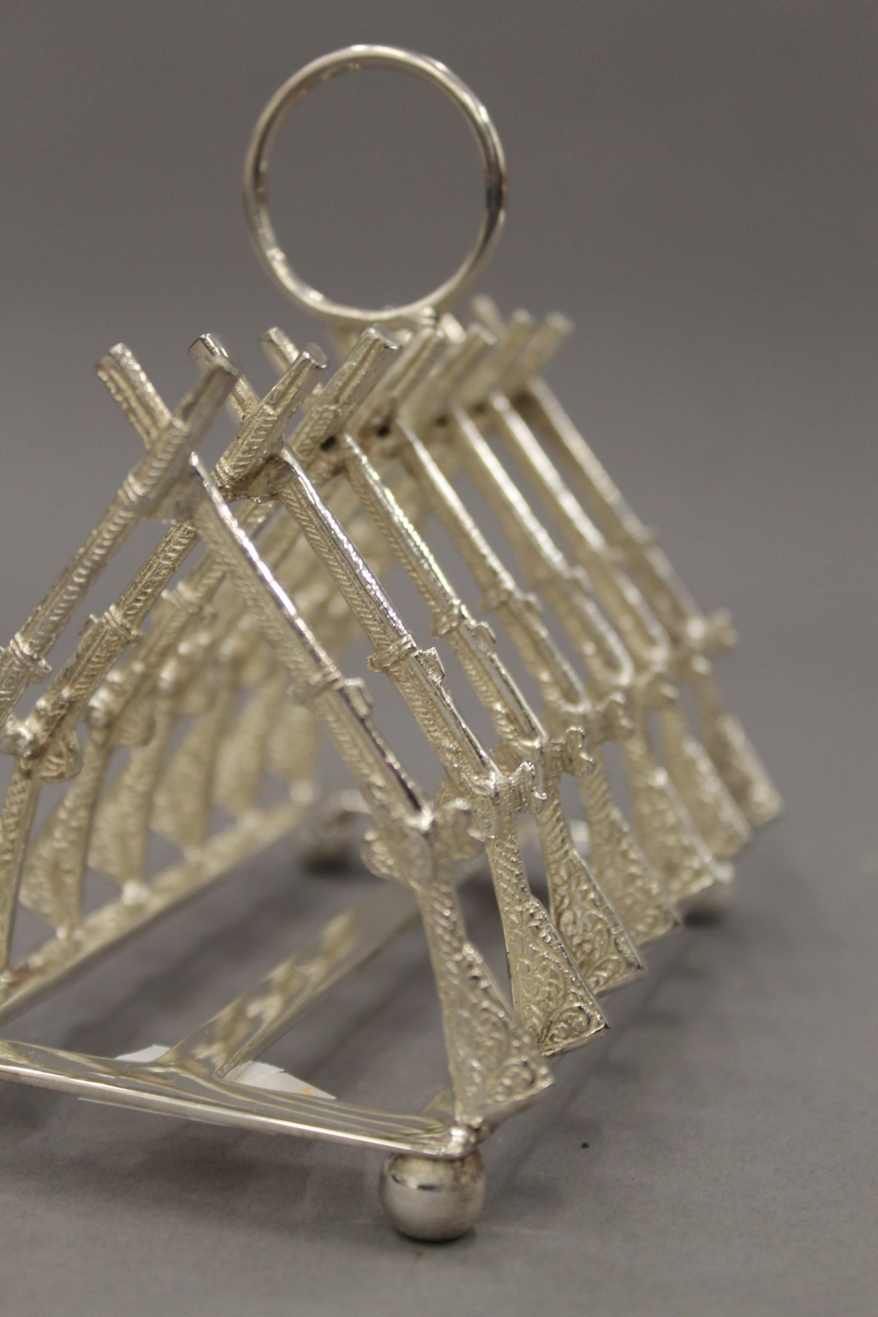 A rifle formed toast rack. 11.5 cm long. - Image 4 of 5