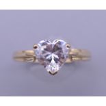 A 14 ct gold cubic zirconia ring. Ring size M. 2.3 grammes total weight.