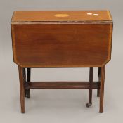 An Edwardian inlaid mahogany Sutherland table. 55.5 cm deep.