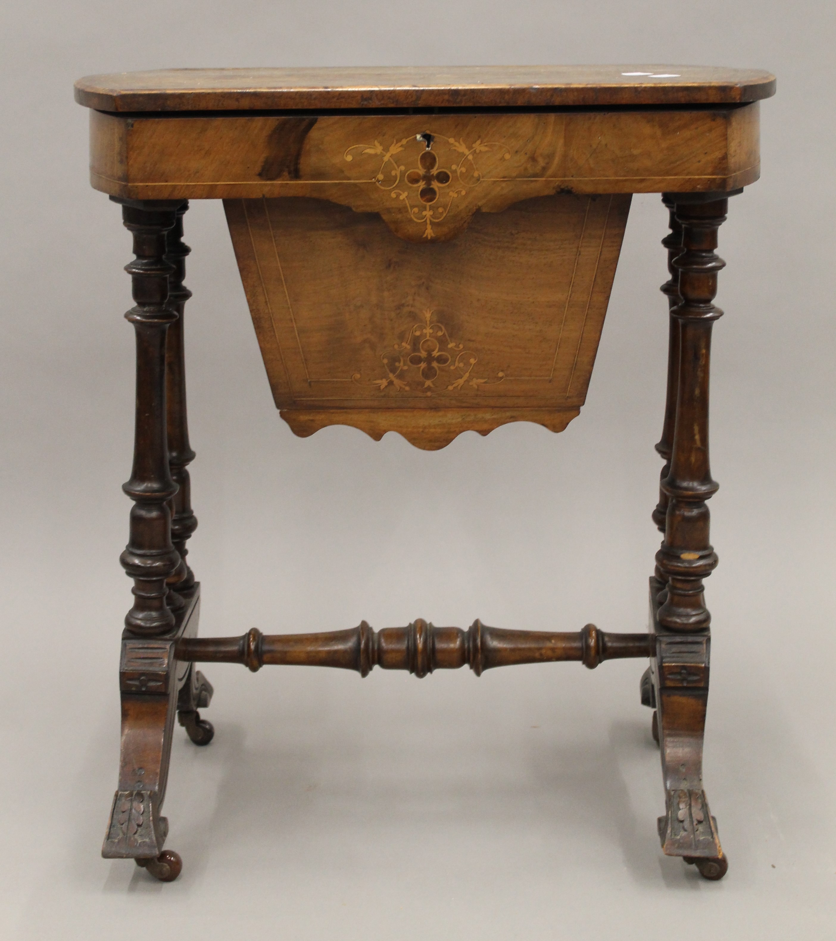 A Victorian inlaid burr walnut work table. - Image 2 of 6