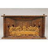 A wooden carving depicting The Last Supper. 81.5 cm wide.
