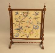 A Victorian tapestry inset fire screen. 71 cm wide.