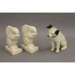A cast iron money box formed as Nipper and a pair of French porcelain bookends formed as squirrels.