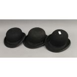 Three vintage bowler hats.