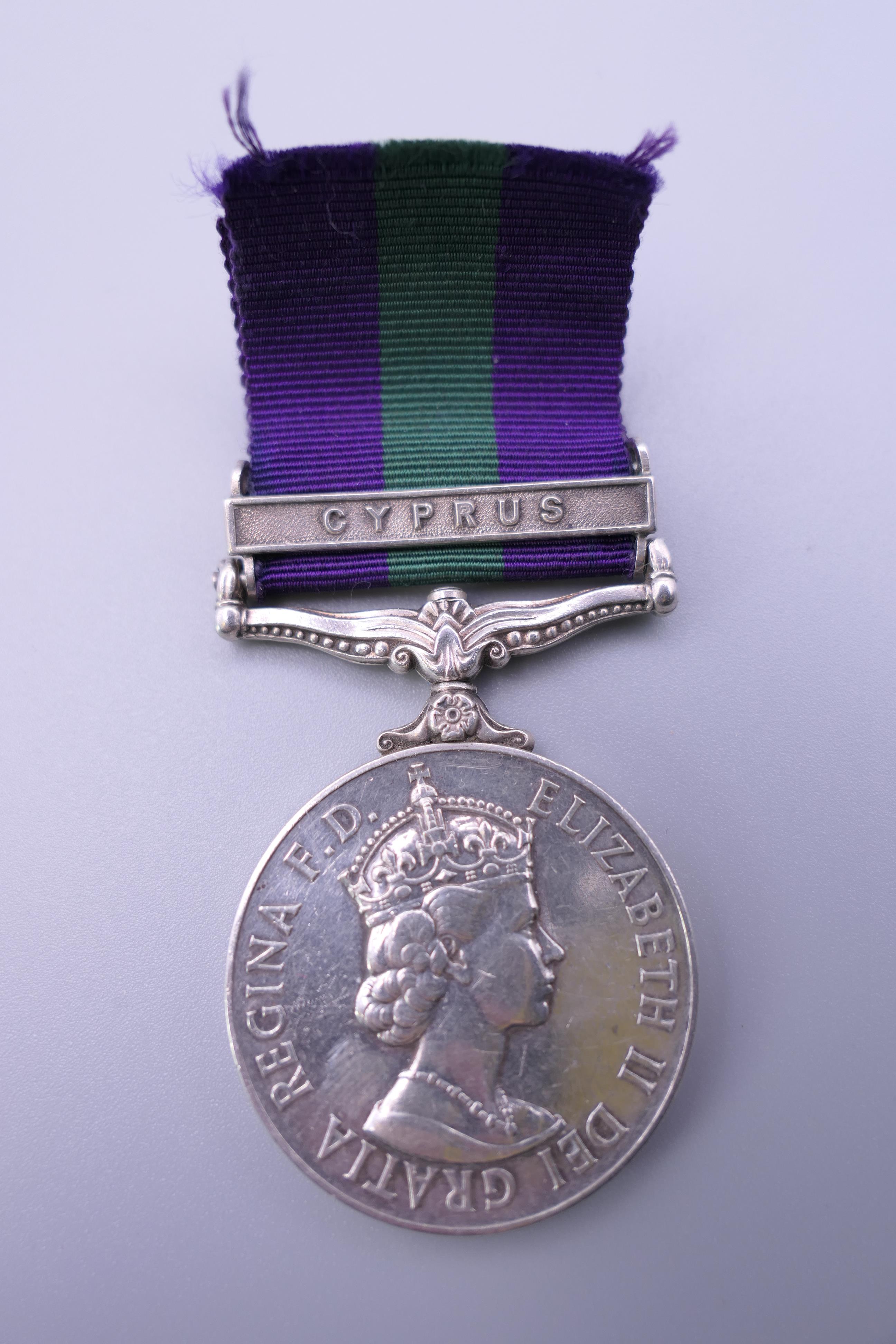 A British Military Elizabeth II General Service medal with Cyprus bar awarded to 23490098 GNR F