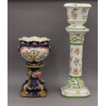 Two porcelain jardiniere's on stands. The largest 93 cm high overall.