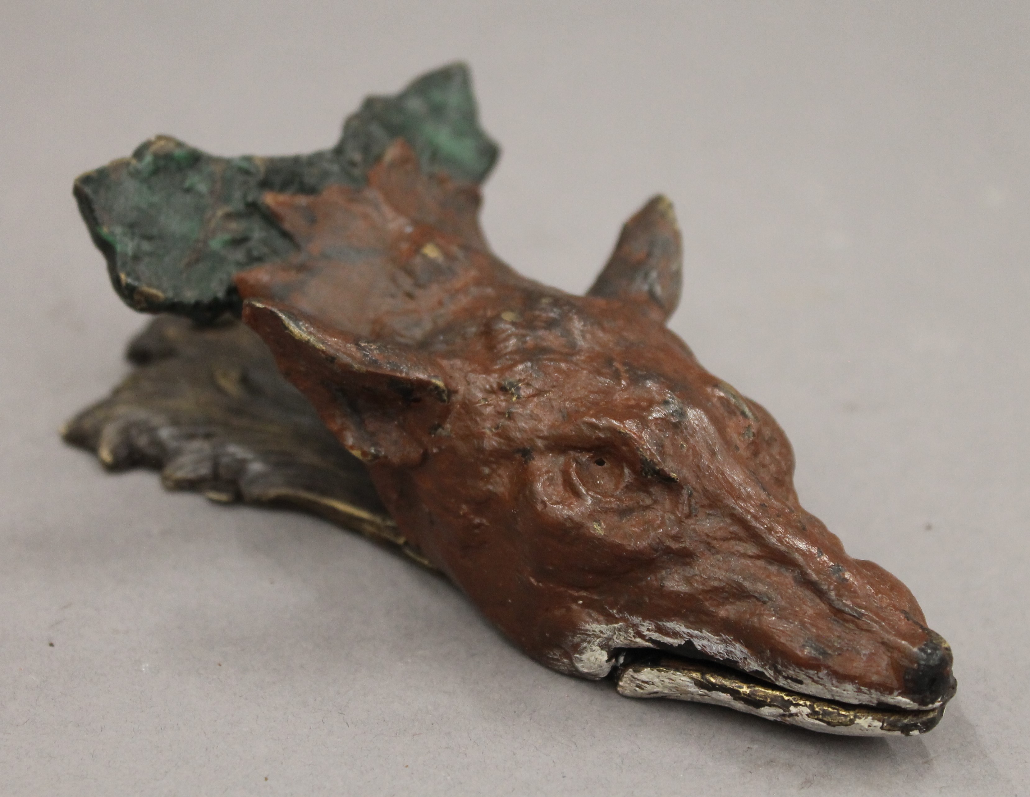A bronze fox mask letter clip. 14.5 cm long.