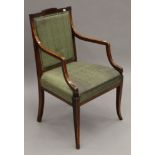 A Victorian upholstered mahogany open armchair. 56 cm wide.