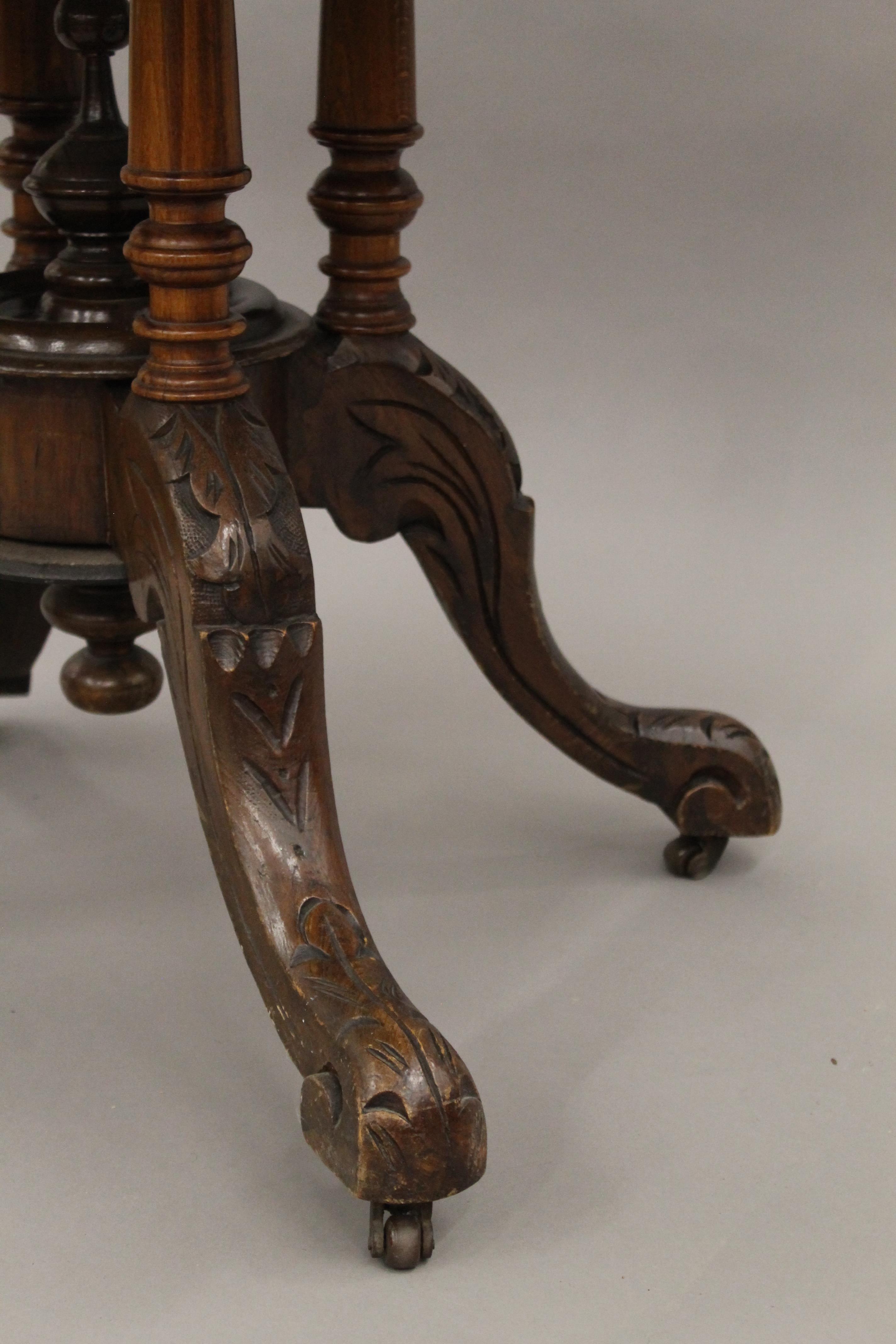 A Victorian walnut loo table. 117 cm long. - Image 4 of 6