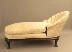 A Victorian mahogany upholstered day bed. 155 cm long.
