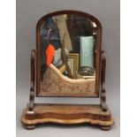 A Victorian mahogany toilet mirror. 61.5 cm wide.