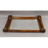 A 19th century inlaid rosewood over mantle mirror. 72 cm wide.