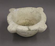 A large marble mortar. 37 cm wide x 14 cm high.