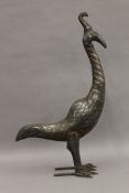 An Eastern unmarked silver inlaid model of a bird. 62 cm high.