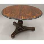 A 19th century rosewood tilt top breakfast table. 120 cm diameter.