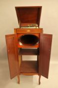 An Edwardian inlaid mahogany Cliftophone gramophone cabinet with integral speaker.