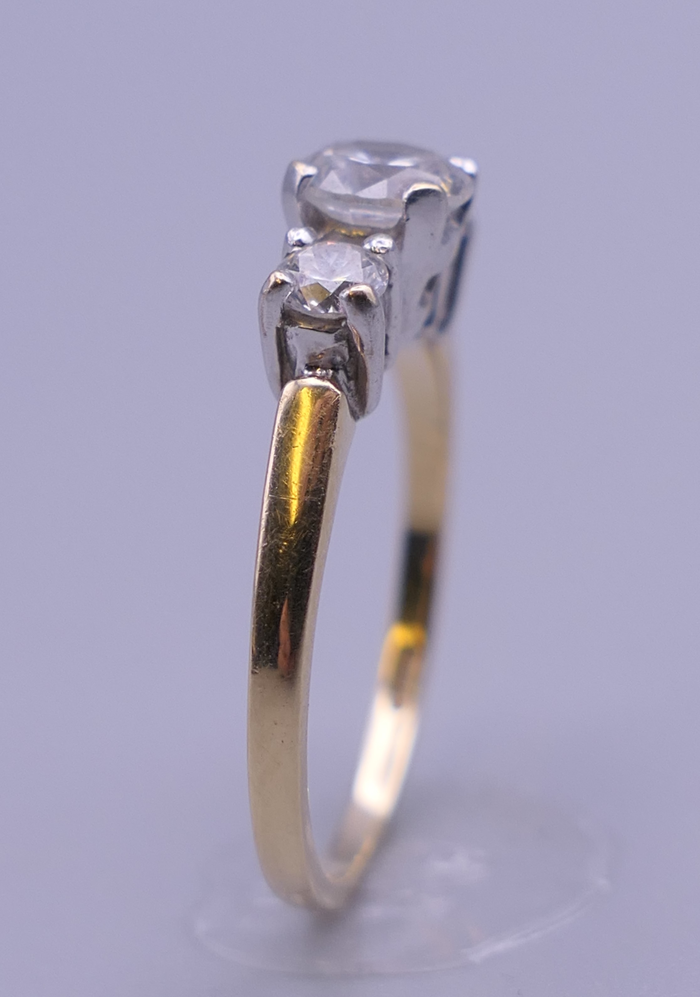 A 14 ct gold cubic zirconia ring. Ring size M. 2.5 grammes total weight. - Image 4 of 8