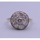 An 18 ct gold diamond ring. Ring size M/N.