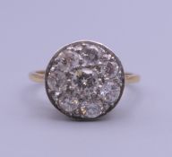 An 18 ct gold diamond ring. Ring size M/N.