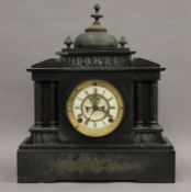 A Victorian black slate mantle clock. 42 cm high.