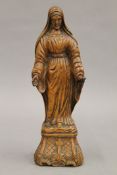 A 19th century carved boxwood model of The Virgin Mary. 20.5 cm high.