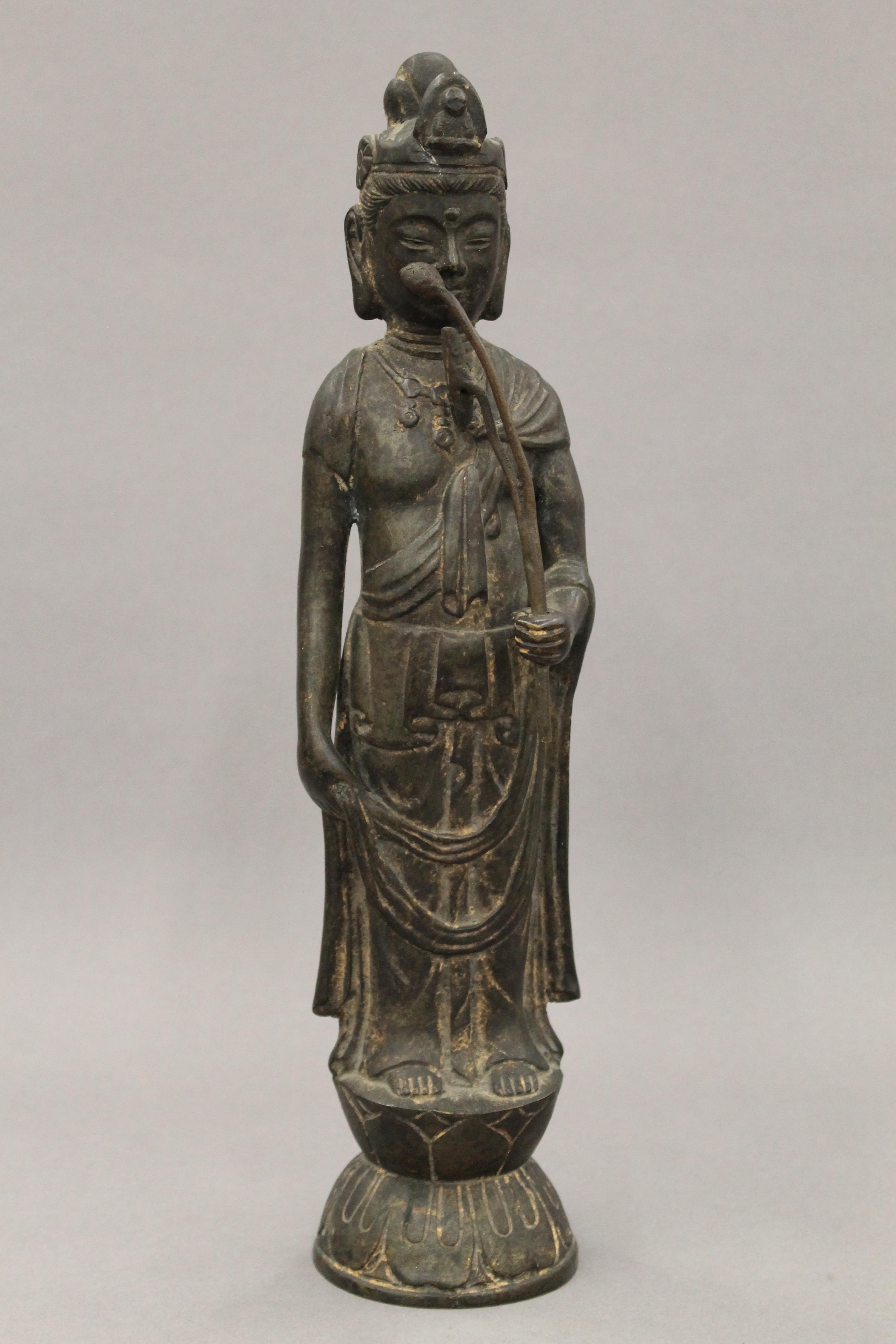 A pair of Chinese patinated bronze models of Guanyin. Each 32 cm high. - Image 8 of 13