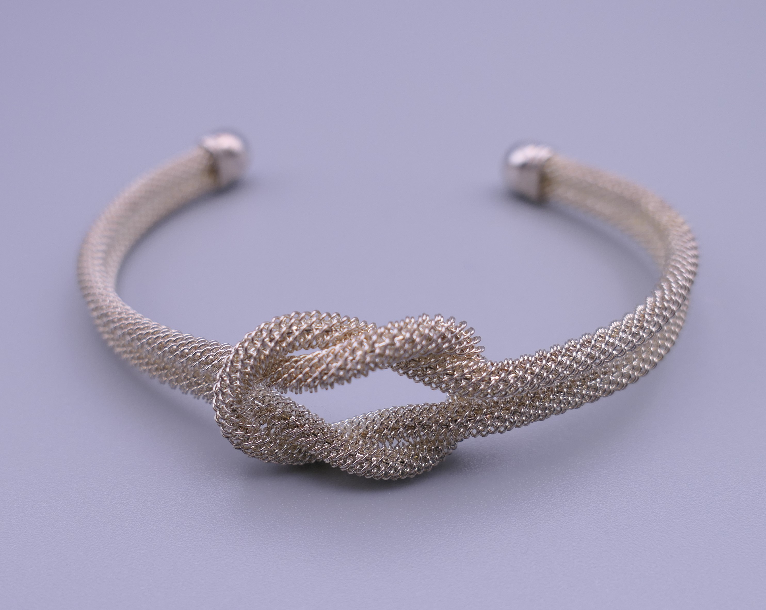 A 925 silver torque knot bracelet. 7.5 cm wide.