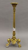 A 19th century ormolu candlestick. 35.5 cm high.