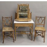 A Victorian bamboo marble topped washstand, a toilet mirror and a pair of chairs,