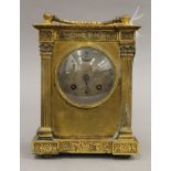 A 19th century French brass cased mantle clock. 24 cm high.