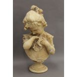 A carved alabaster model of a young girl on a socle base. 53 cm high.