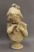 A carved alabaster model of a young girl on a socle base. 53 cm high.