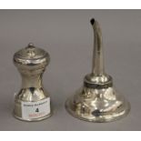 A silver wine funnel and a silver pepper grinder. The former 11.5 cm high. 6.