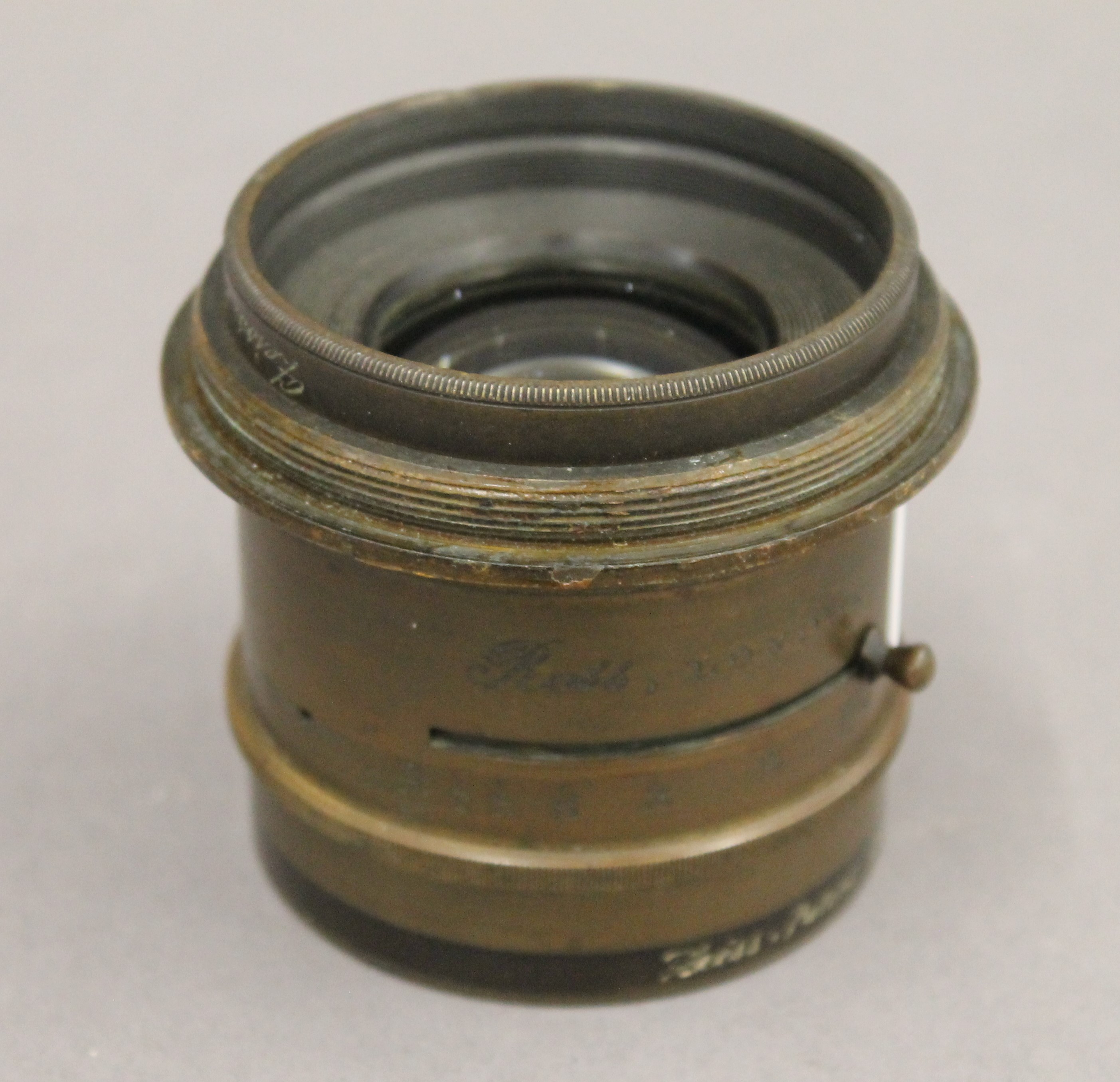 A Zeiss patent 16.5 in convertible anastigment by Ross camera lens. 6.5 cm high.