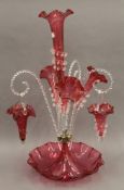 A cranberry glass epergne. 57 cm high.