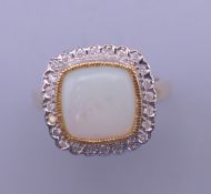 An Art Deco style 9 ct gold opal and diamond ring. Ring size O/P.