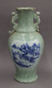 An 18th/19th century Chinese celadon vase. 50.5 cm high.