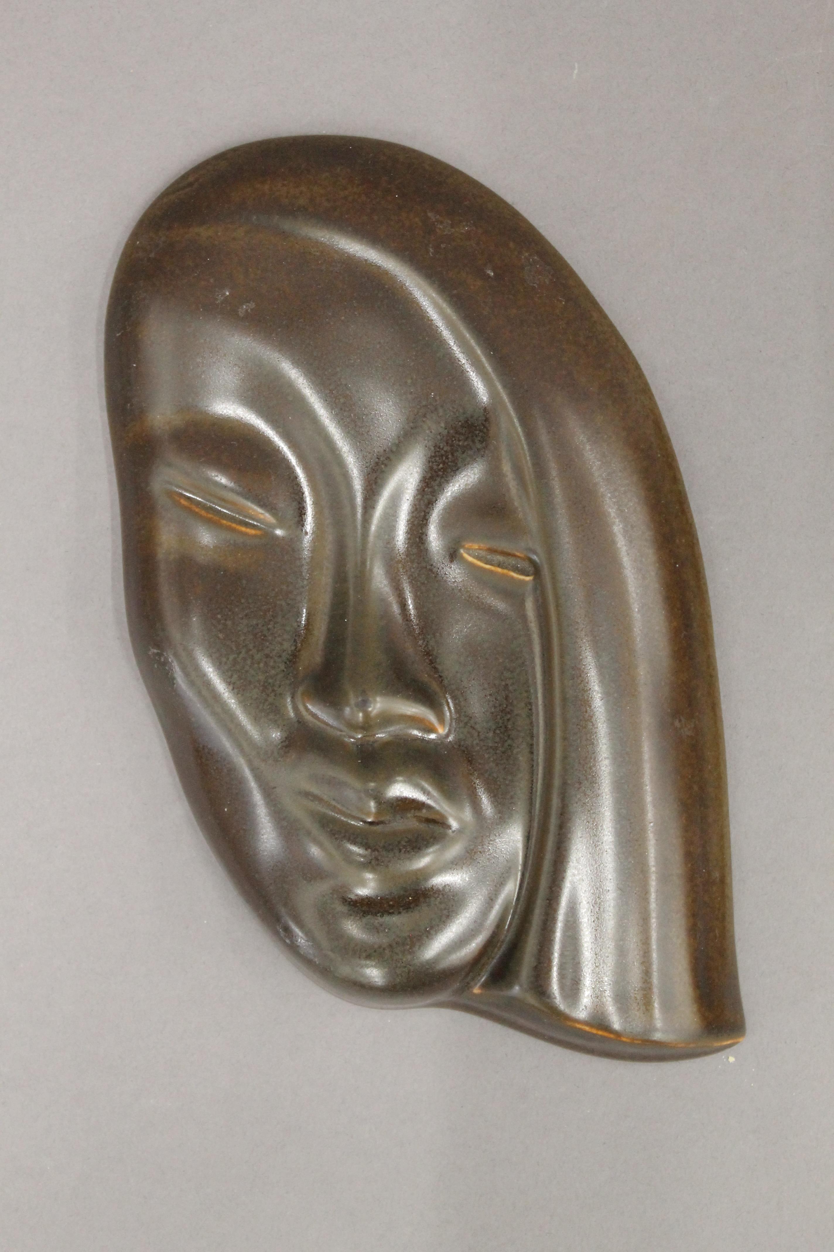 An Art Deco porcelain wall mask and another. The former 23 cm high. - Image 2 of 3