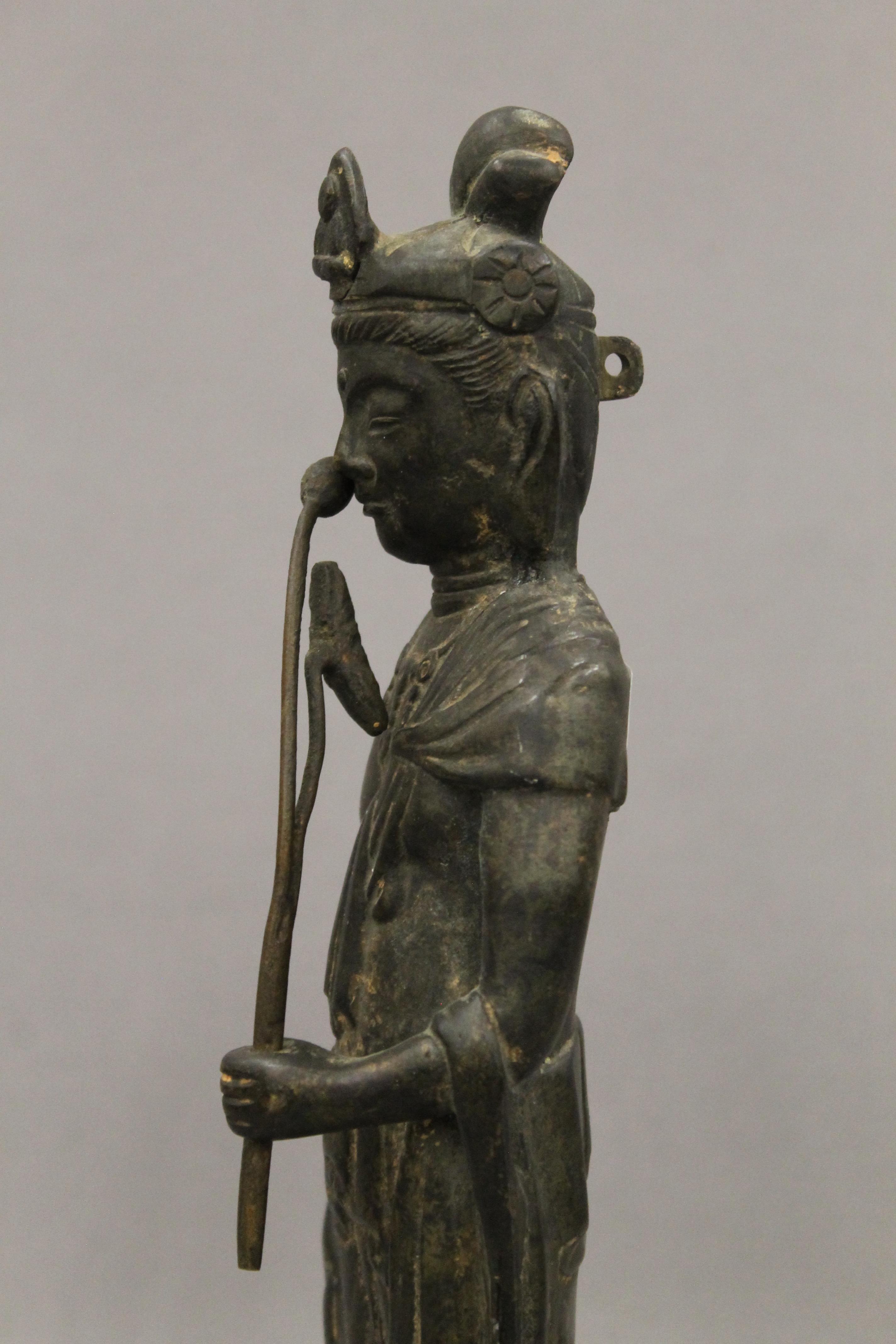 A pair of Chinese patinated bronze models of Guanyin. Each 32 cm high. - Image 10 of 13