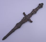 A bronze dagger. 22 cm long.