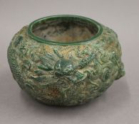 A Chinese green jade vase decorated with dragons. 11 cm high.