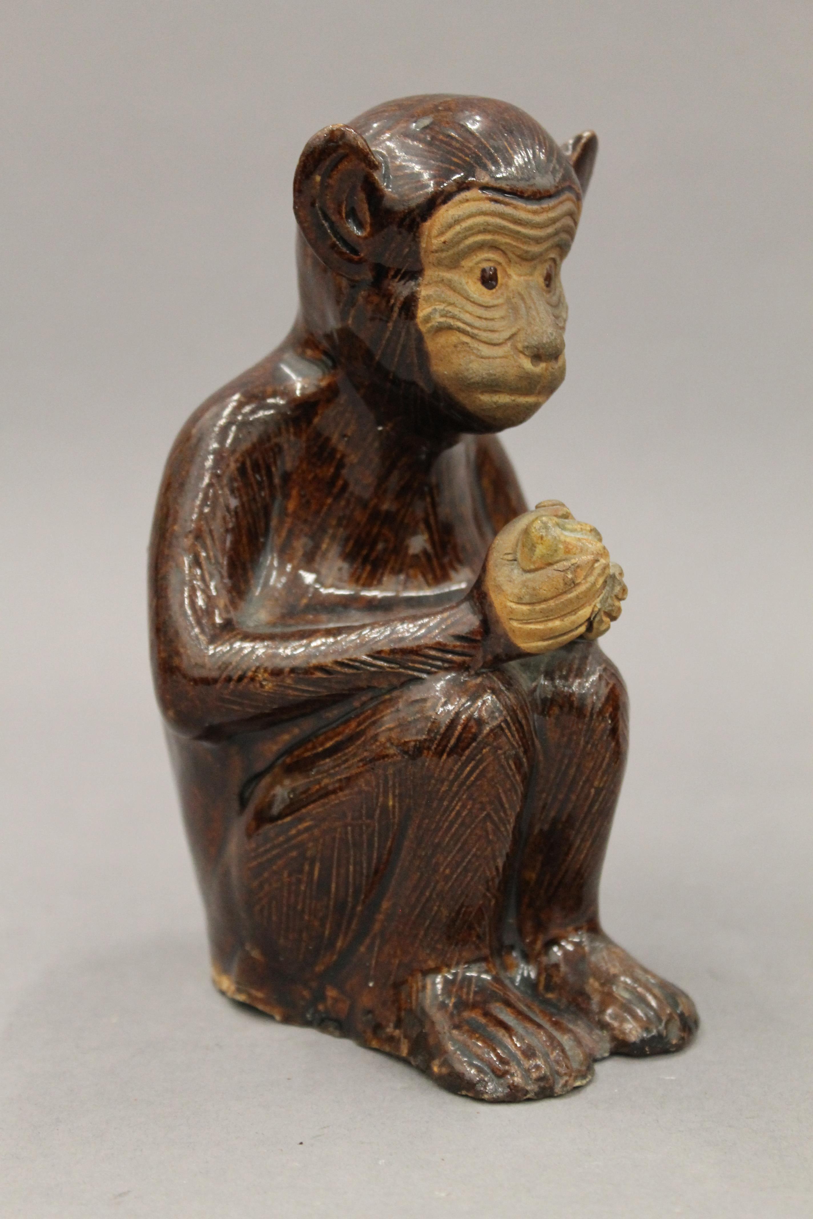 A pair of pottery censers formed as monkeys. Each 15 cm high. - Image 2 of 5