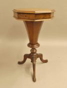 A Victorian inlaid walnut trumpet work table. 70 cm high.