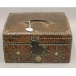 A 17th/18th century decorative studded leather clad domed box. 30.5 cm wide.