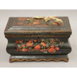 A toleware decorated unusual lined casket, with key. 25 cm wide.